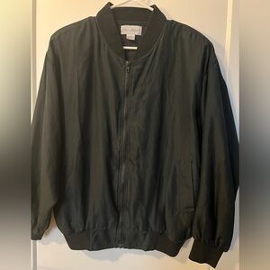 Jessica Robert’s vintage silk bomber Jacket with shoulders pads